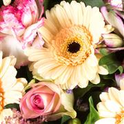 A Sympathy bouquet presented in a Sheaf