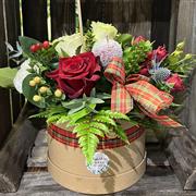 Christmas arrangement in a hat box