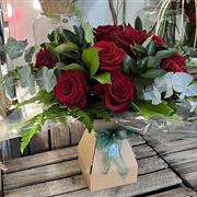 Red roses in a eco friendly box